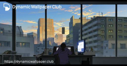 The last scene of Look Back, featuring the protagonist working at her computer in an office with large windows overlooking the city. It is morning.